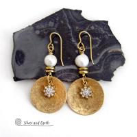 These handcrafted earrings feature gold brass dangles accented with star shaped brass charms with sparkly cubic zirconia crystals. White freshwater pearls and tiny brass beads were added as an accent. They have a classic modern chic style that coordinates beautifully with all wardrobe types - dressed up or down. Makes a great gift for couples celebrating their 21st or 30th anniversary. Brass is the the traditional choice for a 21st anniversary and pearls for a 30th anniversary. 