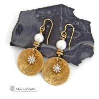 These handcrafted earrings feature gold brass dangles accented with star shaped brass charms with sparkly cubic zirconia crystals. White freshwater pearls and tiny brass beads were added as an accent. They have a classic modern chic style that coordinates beautifully with all wardrobe types - dressed up or down. Makes a great gift for couples celebrating their 21st or 30th anniversary. Brass is the the traditional choice for a 21st anniversary and pearls for a 30th anniversary. 