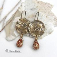 These handcrafted gold brass earrings have a modern, organic earthy style and are accented with natural brown spotted jasper gemstones. Bold, unique and one-of-a-kind - they make a striking statement with a modern edgy vibe. Perfect for women that love unique artisan handcrafted jewelry, earthy hammered textures and natural stones. Handmade in the USA by Silver and Earth Jewelry.