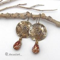 These handcrafted gold brass earrings have a modern, organic earthy style and are accented with natural brown spotted jasper gemstones. Bold, unique and one-of-a-kind - they make a striking statement with a modern edgy vibe. Perfect for women that love unique artisan handcrafted jewelry, earthy hammered textures and natural stones. Handmade in the USA by Silver and Earth Jewelry.