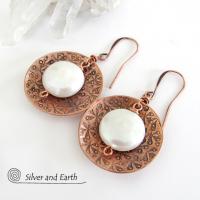 Artisan handcrafted copper earrings with a feminine, elegant style accented with white freshwater coin shaped pearls. Perfect for all occasions, they'll look great dressed up or down. Makes a great gift for couples celebrating their seventh wedding anniversary, as copper is the traditional choice for this occasion. 
