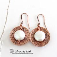 Artisan handcrafted copper earrings with a feminine, elegant style accented with white freshwater coin shaped pearls. Perfect for all occasions, they'll look great dressed up or down. Makes a great gift for couples celebrating their seventh wedding anniversary, as copper is the traditional choice for this occasion. 