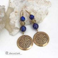 These handcrafted gold brass earrings have an exotic, Egyptian inspired vibe. They feature brass circle dangles with a beautiful embossed texture accented with faceted genuine lapis lazuli gemstones and textured brass beads. Bold and unique, they'll add a touch of cultural exotic charm to any type of wardrobe - dressed up or down. Perfect for women that love unique artisan handcrafted jewelry. Handmade in the USA by Silver and Earth Jewelry. 