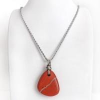 Simple and earthy - this pendant necklace features a natural red jasper gemstone with a wire wrapped sterling silver bail. The stone has a brick red hue with a natural matrix of beige streaks and dots. It has a modern minimalist appeal and is perfect for those that prefer simple, earthy jewelry. It has coordinating earrings which are sold separately. It makes a great gift for a natural stone lover - or a nice addition to your own jewelry wardrobe. Handmade in the USA by Silver and Earth Jewelry. 