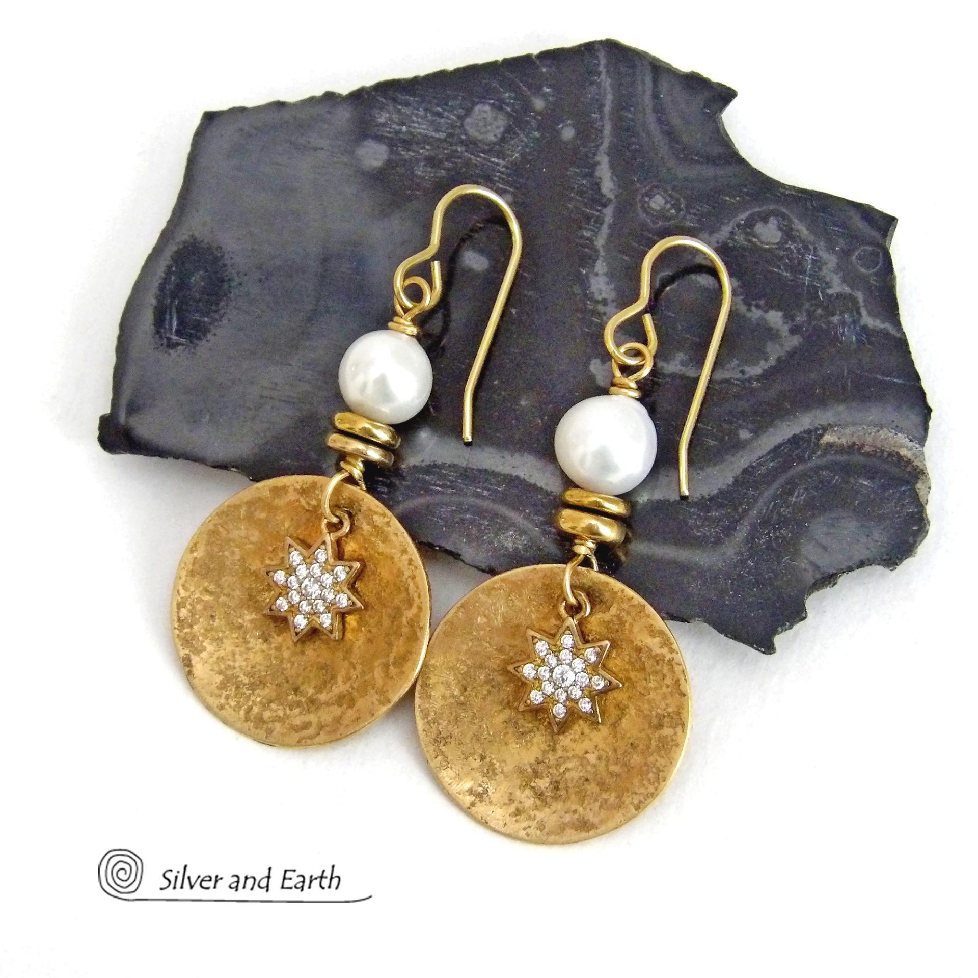 These handcrafted earrings feature gold brass dangles accented with star shaped brass charms with sparkly cubic zirconia crystals. White freshwater pearls and tiny brass beads were added as an accent. They have a classic modern chic style that coordinates beautifully with all wardrobe types - dressed up or down. Makes a great gift for couples celebrating their 21st or 30th anniversary. Brass is the the traditional choice for a 21st anniversary and pearls for a 30th anniversary. 