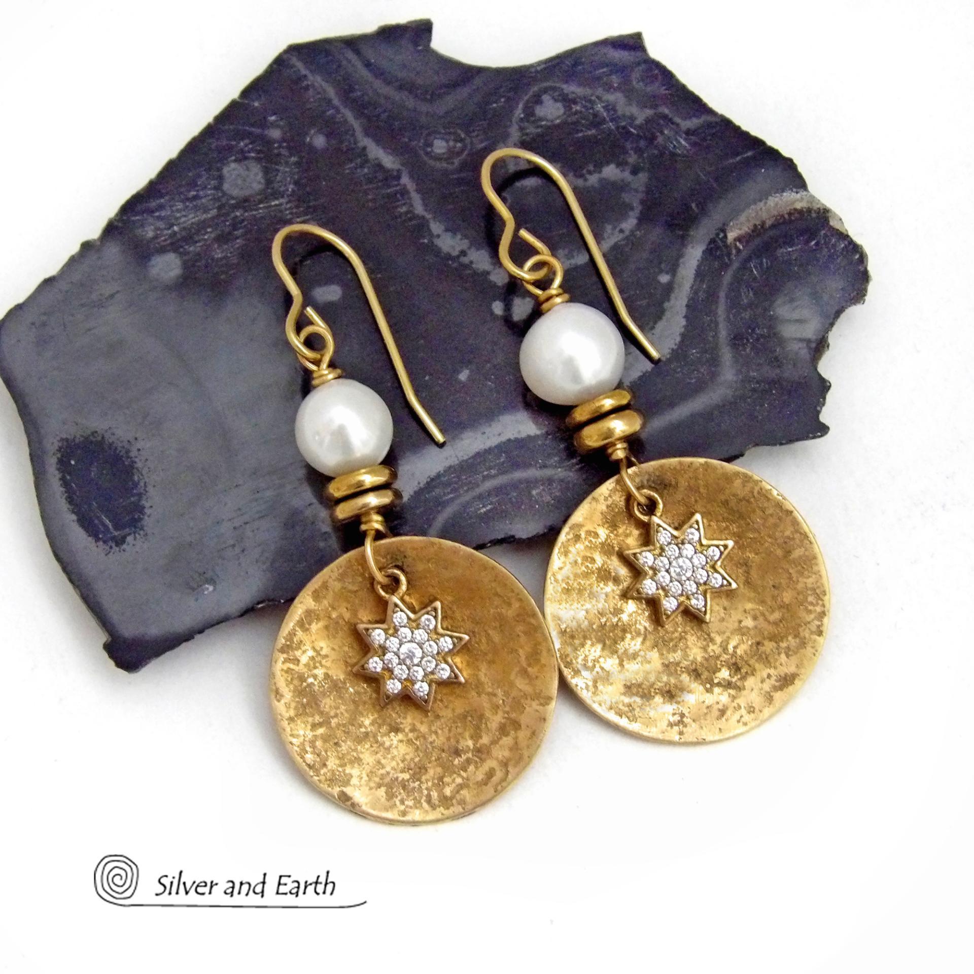 These handcrafted earrings feature gold brass dangles accented with star shaped brass charms with sparkly cubic zirconia crystals. White freshwater pearls and tiny brass beads were added as an accent. They have a classic modern chic style that coordinates beautifully with all wardrobe types - dressed up or down. Makes a great gift for couples celebrating their 21st or 30th anniversary. Brass is the the traditional choice for a 21st anniversary and pearls for a 30th anniversary. 