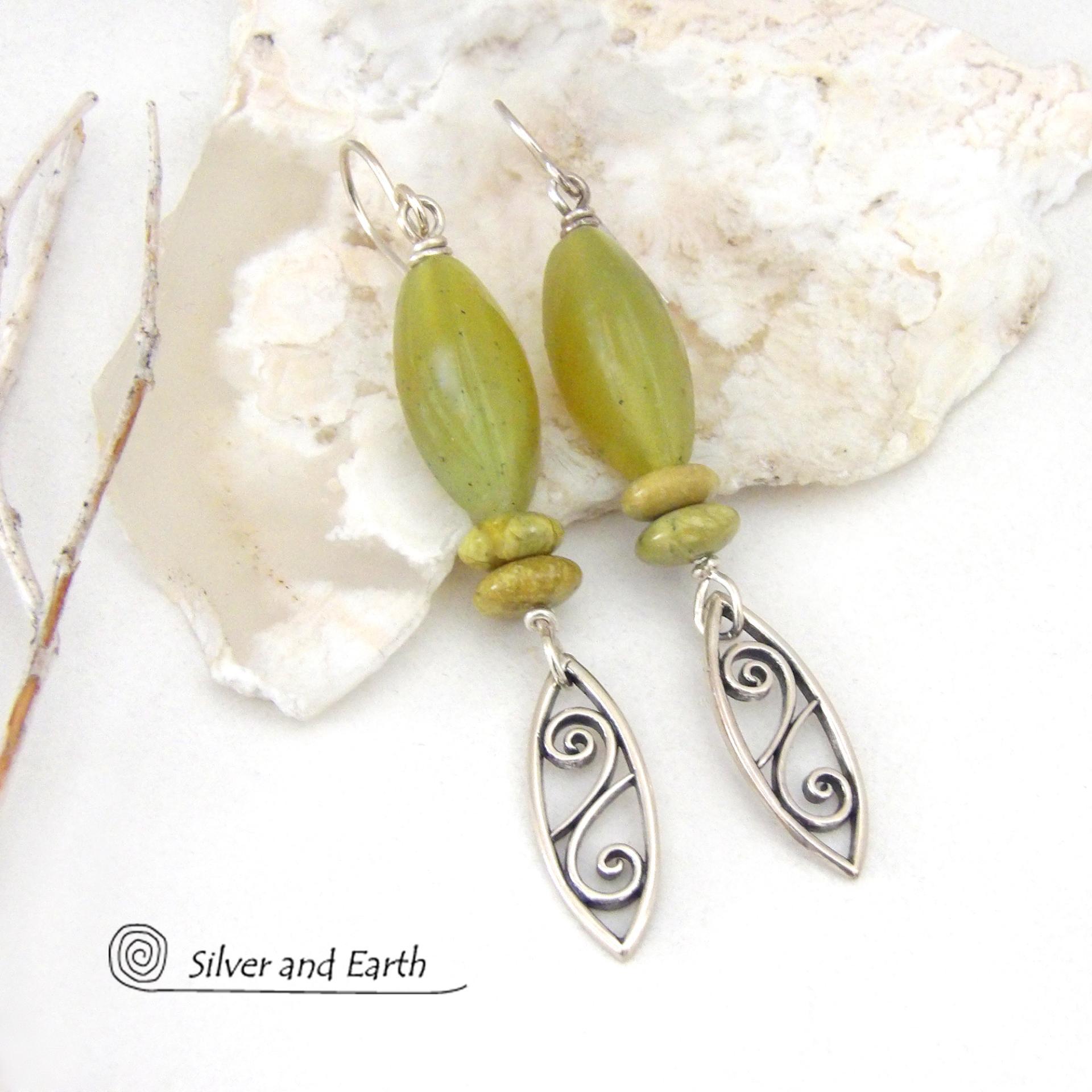 These sterling silver earrings have an earthy, classic and modern feel. They feature sterling silver leaf shapes with a scrolling spiral pattern accented with natural green serpentine gemstones. Lightweight and comfortable to wear, they'll coordinate with all wardrobe styles. 