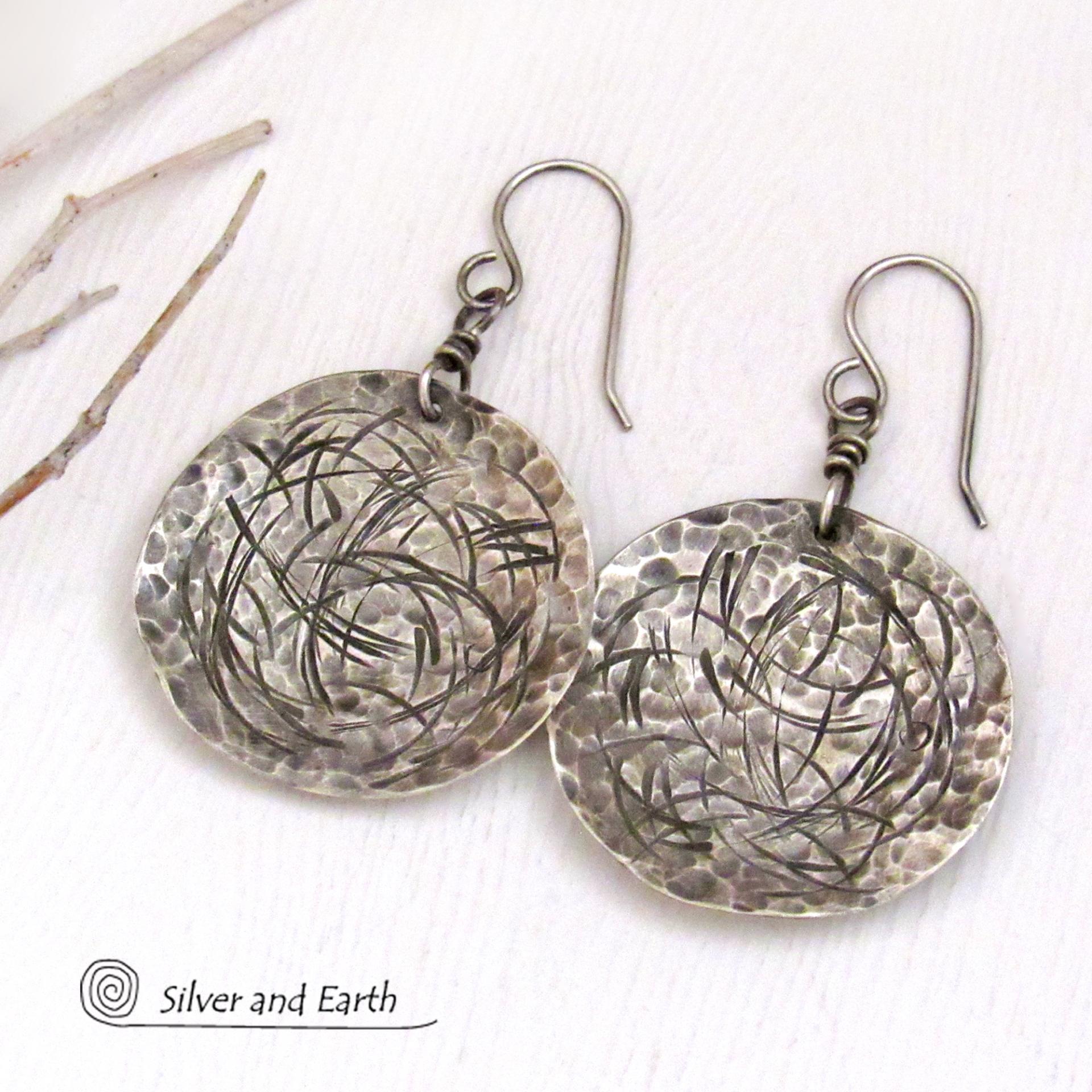 These handcrafted sterling silver earrings have modern, contemporary style and are perfect for everyday wear -- they go with everything. They have a hammered and hand stamped abstract texture that was oxidized to highlight the details. Lightweight and comfortable to wear, they'll coordinate beautifully with all wardrobe styles.