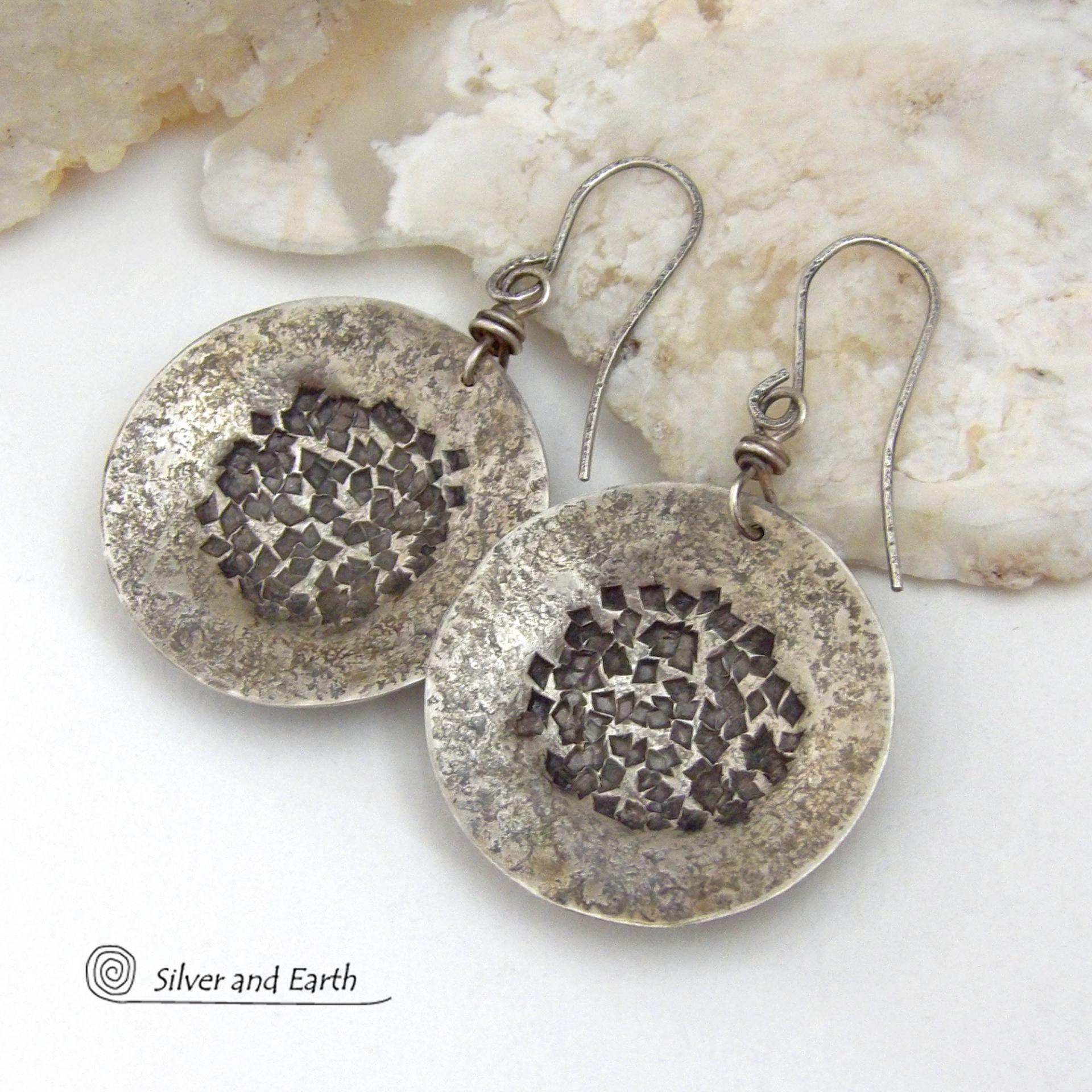 Bold, earthy and modern - these sterling silver dangle earrings are perfect for everyday wear. A classic staple for every jewelry lover's wardrobe - because they go with everything! Handcrafted entirely in solid sterling silver. I created the shapes out of sterling silver sheet; hammered and stamped the metal to create the rustic, organic texture; then oxidized them to enhance the detail. Handmade in the USA by Silver and Earth Jewelry.