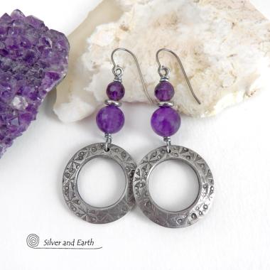 These handcrafted silver pewter hoop earrings have a hand stamped texture and are accented with a stack of purple amethyst gemstones and tiny stainless steel spacer beads. They have a modern, elegant chic style that will look great with all wardrobe styles - dressed up or down. Makes a great gift for someone with a February birthday - amethyst is that month's birthstone. Handmade in the USA by Silver and Earth Jewelry.