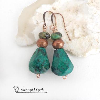 Natural chunky African turquoise gemstones are accented with copper beads and smaller African turquoise beads in these modern boho earrings. The stones on the bottom have an organic faceted cut. They'll make a great gift for anyone that loves natural stone jewelry - or a nice addition to your own jewelry wardrobe.