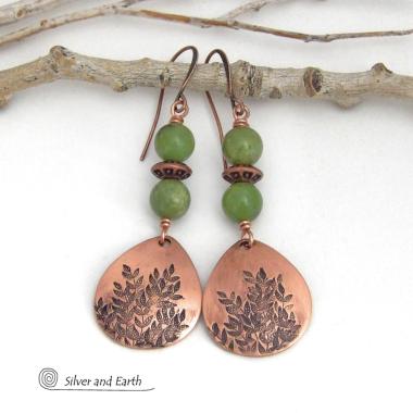 These handcrafted earrings feature teardrop shaped copper dangles with a hand-stamped leaf texture accented with natural green jade gemstones and copper beads. They have an earthy, modern style that coordinates well with all wardrobe styles. They'll make a great gift for a nature lover - or a nice addition to your own jewelry wardrobe. Your choice of copper ear wires or niobium hypoallergenic ear wires. Earrings are handmade in the USA by Silver and Earth Jewelry. 