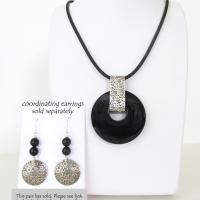 These handcrafted sterling silver earrings feature a unique, hand-stamped design and are accented with black onyx gemstones. Perfect for everyday wear, they'll look great with all wardrobe styles from office attire to casual wear. They are also lightweight and comfortable to wear. They'll make a great wife gift for couples celebrating their seventh anniversary - onyx is the gemstone for this occasion. 