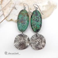 Big, long natural African turquoise stones are accented with rustic hammered sterling silver dangles in these one-of-a-kind earrings. They have an earthy, organic style and are perfect for anyone that loves natural stones and unique handcrafted artisan jewelry. I hand sawed the dangles out of solid sterling silver sheet; hammered them for texture; crimped the edges for a ruffled effect; then added a few holes for a rustic vibe. Handmade in the USA by Silver and Earth Jewelry.