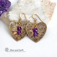 These gold brass heart earrings have a romantic, feminine charm and will make a great gift for someone special. They feature handcrafted gold brass hearts with a hand stamped texture accented with faceted amethyst gemstones dangling in front. The perfect gift to say "I love you" on Valentine's Day or any day! They'll also make a great gift for someone born in February - amethyst is the birthstone for this month.  Makes a great gift for couples celebrating their 21st wedding anniversary.