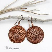 These handcrafted copper earrings have a beautifully detailed embossed cobblestone texture. Big and bold, they'll make a striking statement. Unique and versatile, they are lightweight and comfortable to wear and will look great with all wardrobe styles. Handmade in the USA by Silver and Earth Jewelry. Your choice of ear wire - copper or hypoallergenic niobium.
