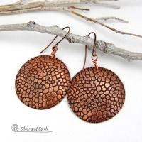 These handcrafted copper earrings have a beautifully detailed embossed cobblestone texture. Big and bold, they'll make a striking statement. Unique and versatile, they are lightweight and comfortable to wear and will look great with all wardrobe styles. Handmade in the USA by Silver and Earth Jewelry. Your choice of ear wire - copper or hypoallergenic niobium.