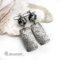 These sterling silver earrings have an earthy, organic and modern contemporary flair. They feature handcrafted sterling silver rectangles with a rustic hammered texture accented with round chunky agate gemstones. The stones have a striking natural matrix of white, gray and black speckles which create a granite-like effect. Unique and one-of-a-kind, they'll make a great gift for women that love bold unique jewelry and natural stones. 