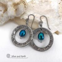 These handcrafted silver pewter hoop earrings have a hand stamped texture and are accented with beautiful blue freshwater pearls. They have a modern chic, classic style that is always in fashion and will coordinate beautifully with all wardrobe types. Makes a great gift for someone born in June. Pearl is the traditional gemstone for this month. Also makes a great wife gift for couples celebrating their 10th year of marriage. Pewter is the traditional metal for this occasion. Handmade in the USA by Silver an