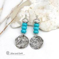 These handcrafted earrings feature textured sterling silver dangles accented with a stack of blue turquoise stones topped off with silver pewter beads. They have a modern chic style with a touch of southwestern flair and are perfect for anyone that loves the southwest style.  