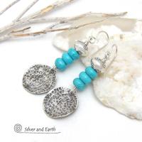 These handcrafted earrings feature textured sterling silver dangles accented with a stack of blue turquoise stones topped off with silver pewter beads. They have a modern chic style with a touch of southwestern flair and are perfect for anyone that loves the southwest style.  