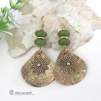 These handcrafted gold brass earrings have an earthy and modern nature-inspired charm. The design consists of brass fan-shaped dangles accented with Canadian green jade gemstones, brass flower charms and brass beads. The flowers have a lovely detailed texture and swing freely in front of the lightly hammered brass dangles. Perfect for your spring / summer wardrobe - or any time of year. They'll make a great gift for a nature and/or flower lover - or a nice addition to your own jewelry wardrobe. 