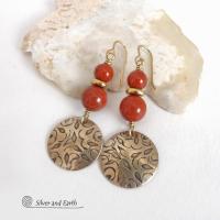 These handcrafted earrings have an elegant, modern chic style that coordinates beautifully with all wardrobe types -- dressed up or down. They feature gold brass dangles with a hand stamped texture accented with a stack of red jasper gemstones and shiny brass beads. They'll make a great gift for a natural gemstone lover - or a nice addition to your own jewelry wardrobe. Handmade in the USA by Silver and Earth jewelry.