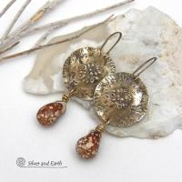 These handcrafted gold brass earrings have a modern, organic earthy style and are accented with natural brown spotted jasper gemstones. Bold, unique and one-of-a-kind - they make a striking statement with a modern edgy vibe. Perfect for women that love unique artisan handcrafted jewelry, earthy hammered textures and natural stones. Handmade in the USA by Silver and Earth Jewelry.