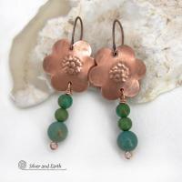 These hand forged copper flower earrings are accented with a stack of dangling turquoise stones. They have an earthy, whimsical charm and will make a great gift for nature / flower lovers and couples celebrating their seventh wedding anniversary. Copper is the traditional choice for this anniversary. Handmade in the USA by Silver and Earth Jewelry. 