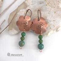These hand forged copper flower earrings are accented with a stack of dangling turquoise stones. They have an earthy, whimsical charm and will make a great gift for nature / flower lovers and couples celebrating their seventh wedding anniversary. Copper is the traditional choice for this anniversary. Handmade in the USA by Silver and Earth Jewelry. 
