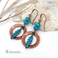 These handcrafted earrings feature round copper hoops with a hammered texture accented with a stack of turquoise beads and patina blue verdigris feathers. Lightweight and comfortable to wear - they'll add a touch of boho southwestern style to your wardrobe. Handmade in the USA by Silver and Earth Jewelry. 