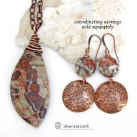 This necklace features a natural rhyolite jasper stone with a natural pattern in earthy hues of rusty orange, brown and taupe. It is wrapped in oxidized copper wire and comes on an 18" copper chain necklace. It has an earthy, natural style and will make a great gift for a natural stone lover - or a nice addition to your own jewelry collection. The chain can be removed from the pendant and worn with other pendants in your wardrobe. Coordinating earrings sold separately. 