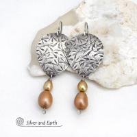 These artisan handcrafted sterling silver earrings have a hand stamped texture and are accented with a stack of dangling 2-tone gold freshwater pearls. They have a modern, contemporary style that looks good with all wardrobe styles -dressed up or down. They'll make a great gift for women that love unique handmade jewelry. 