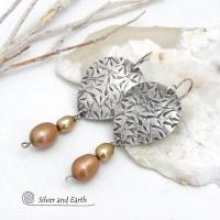 These artisan handcrafted sterling silver earrings have a hand stamped texture and are accented with a stack of dangling 2-tone gold freshwater pearls. They have a modern, contemporary style that looks good with all wardrobe styles -dressed up or down. They'll make a great gift for women that love unique handmade jewelry. 