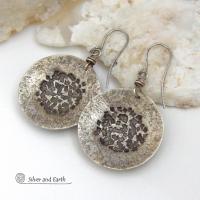 Bold, earthy and modern - these sterling silver dangle earrings are perfect for everyday wear. A classic staple for every jewelry lover's wardrobe - because they go with everything! Handcrafted entirely in solid sterling silver. I created the shapes out of sterling silver sheet; hammered and stamped the metal to create the rustic, organic texture; then oxidized them to enhance the detail. Handmade in the USA by Silver and Earth Jewelry.