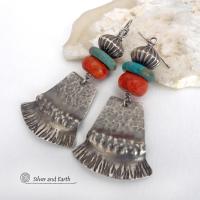 These handcrafted earrings feature hammered and hand stamped sterling silver dangles accented with a stack of natural turquoise stones, fossilized red coral and oxidized sterling silver Native style beads with a rich, corrugated texture. They have a modern, southwestern tribal flair that makes a bold statement. Perfect for women that love the southwest Santa Fe style and fashion. Handmade by Silver and Earth, a New Mexico True Certified business.  