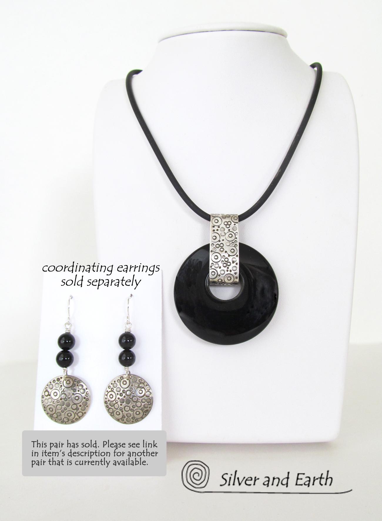 These handcrafted sterling silver earrings feature a unique, hand-stamped design and are accented with black onyx gemstones. Perfect for everyday wear, they'll look great with all wardrobe styles from office attire to casual wear. They are also lightweight and comfortable to wear. They'll make a great wife gift for couples celebrating their seventh anniversary - onyx is the gemstone for this occasion. 