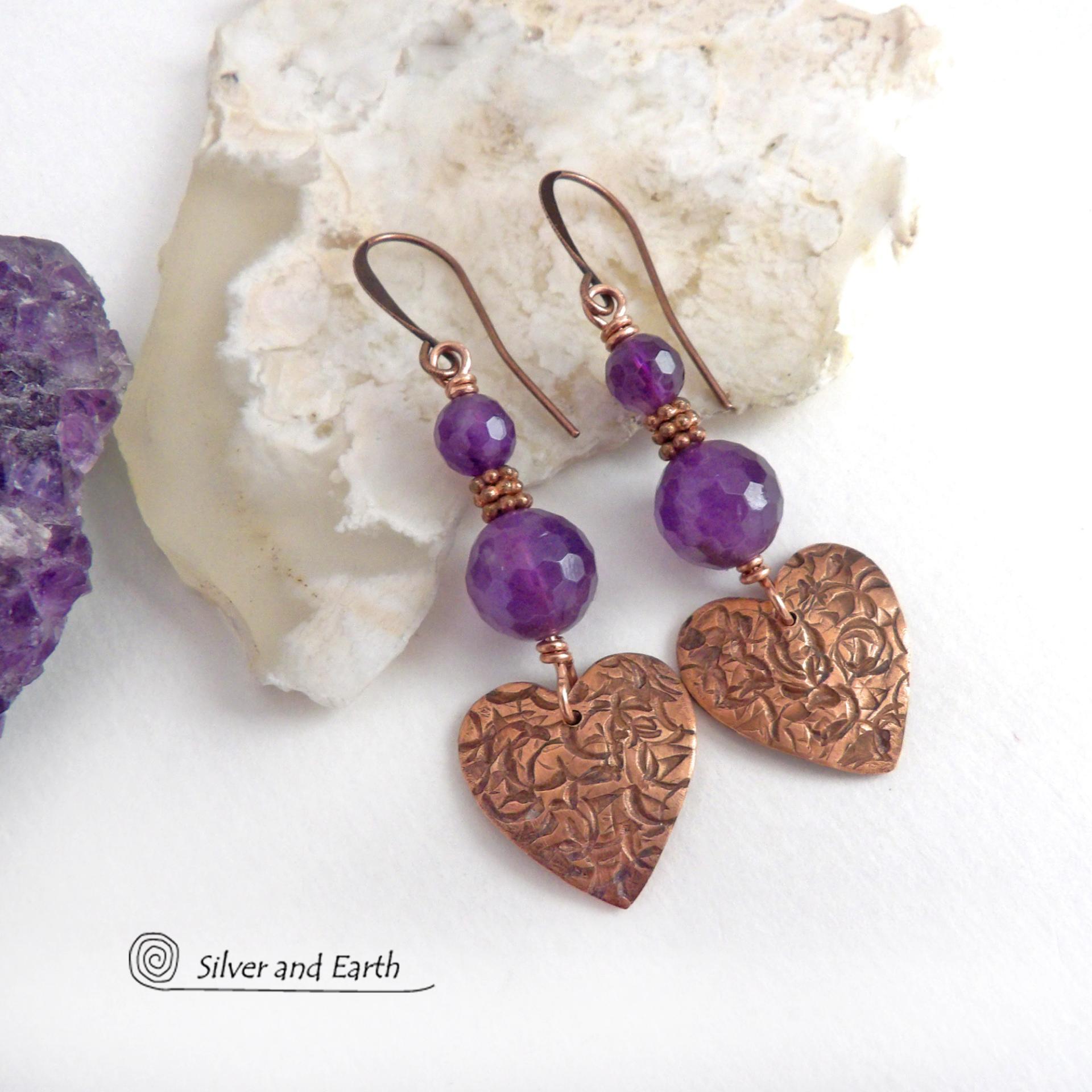 These handcrafted copper heart dangle earrings have a hand stamped texture and are accented with genuine purple amethyst gemstones with a faceted finish and tiny copper beads. Modern, classic and elegant - the style is always in fashion. The perfect gift for someone special on Valentine's Day or any day! They'll also make a great gift for someone with a February birthday or 6th anniversary - amethyst is the gemstone for either occasion. Or a 7th anniversary gift - copper is the traditional theme for this. 
