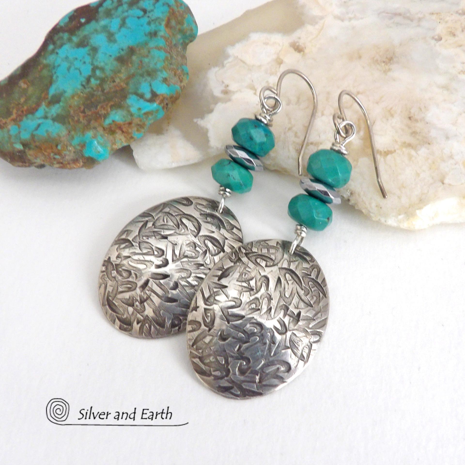 Handcrafted earrings with sterling silver oval dangles with a hand stamped texture accented with natural turquoise and hematite gemstones. The stones have a faceted finish which casts off a natural sparkle and shine. They have a modern style with southwestern flair that looks great with all wardrobe types. Perfect for women that love modern style southwest jewelry. Handmade in the USA by Silver and Earth Jewelry, a New Mexico True Certified business.