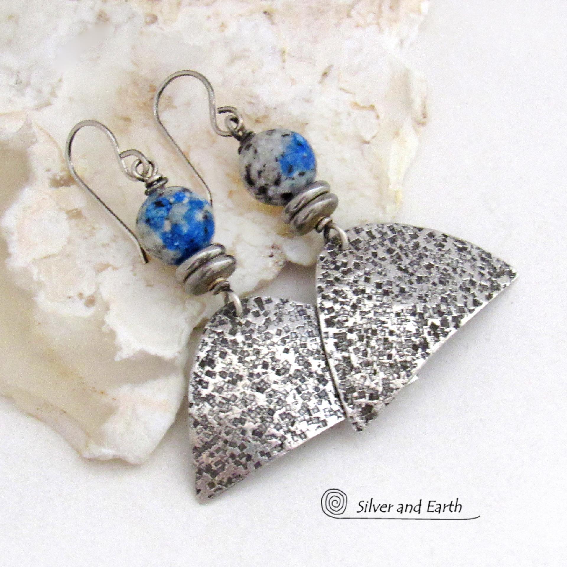 Handcrafted sterling silver earrings with rustic hammered sterling dangles accented with K2 granite gemstones. This unique, interesting stone has beautiful blue azurite inclusions within a black and white speckled granite base