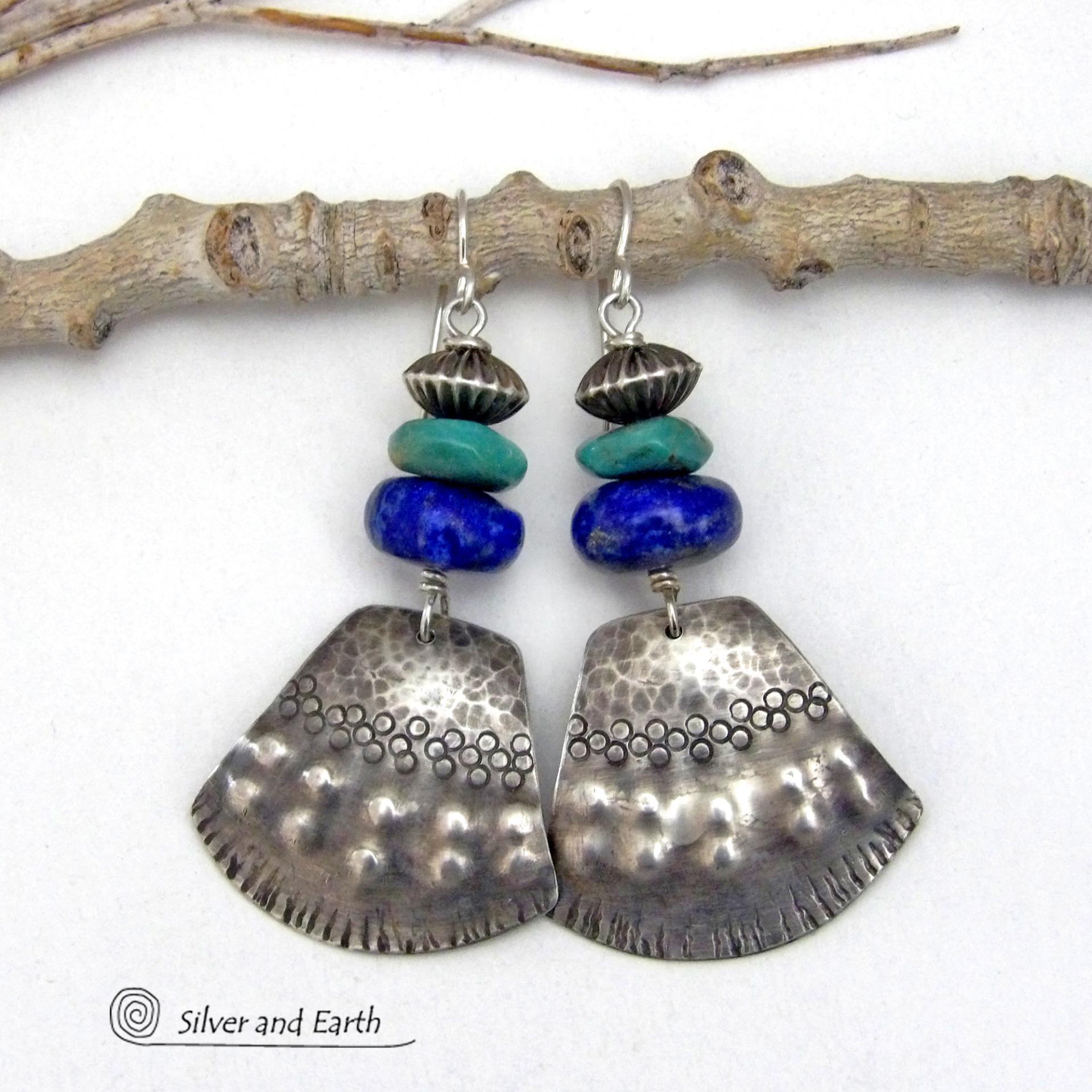 Bold and striking, these handcrafted earrings feature uniquely textured sterling silver accented with natural turquoise and lapis gemstones. They are topped off with Native style oxidized sterling silver beads with a rich, corrugated texture. They have a modern southwestern flair and are perfect for women that love to wear one-of-a-kind artisan handcrafted jewelry. Handmade in the USA by Silver and Earth - a New Mexico True Certified business.