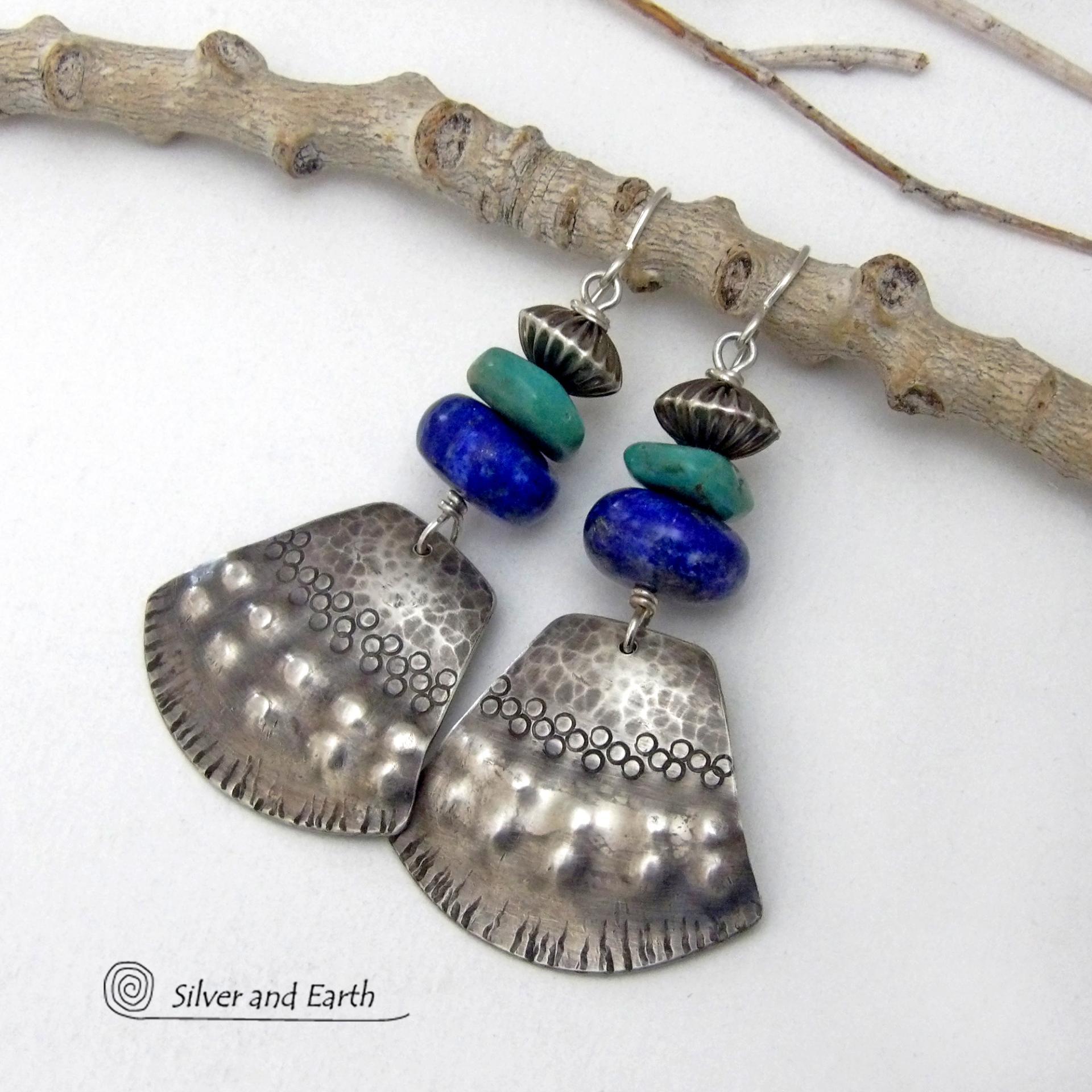 Bold and striking, these handcrafted earrings feature uniquely textured sterling silver accented with natural turquoise and lapis gemstones. They are topped off with Native style oxidized sterling silver beads with a rich, corrugated texture. They have a modern southwestern flair and are perfect for women that love to wear one-of-a-kind artisan handcrafted jewelry. Handmade in the USA by Silver and Earth - a New Mexico True Certified business.