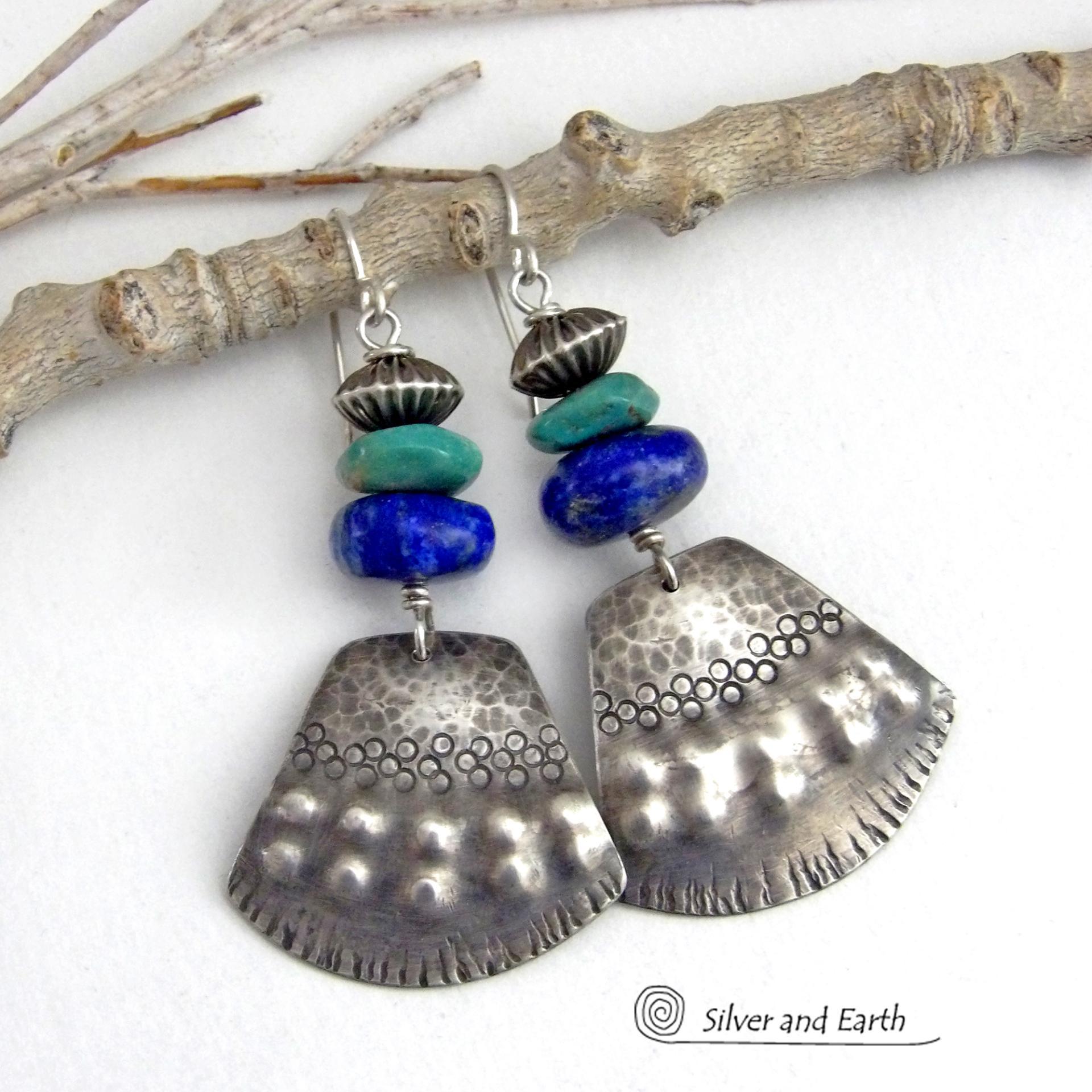 Bold and striking, these handcrafted earrings feature uniquely textured sterling silver accented with natural turquoise and lapis gemstones. They are topped off with Native style oxidized sterling silver beads with a rich, corrugated texture. They have a modern southwestern flair and are perfect for women that love to wear one-of-a-kind artisan handcrafted jewelry. Handmade in the USA by Silver and Earth - a New Mexico True Certified business.
