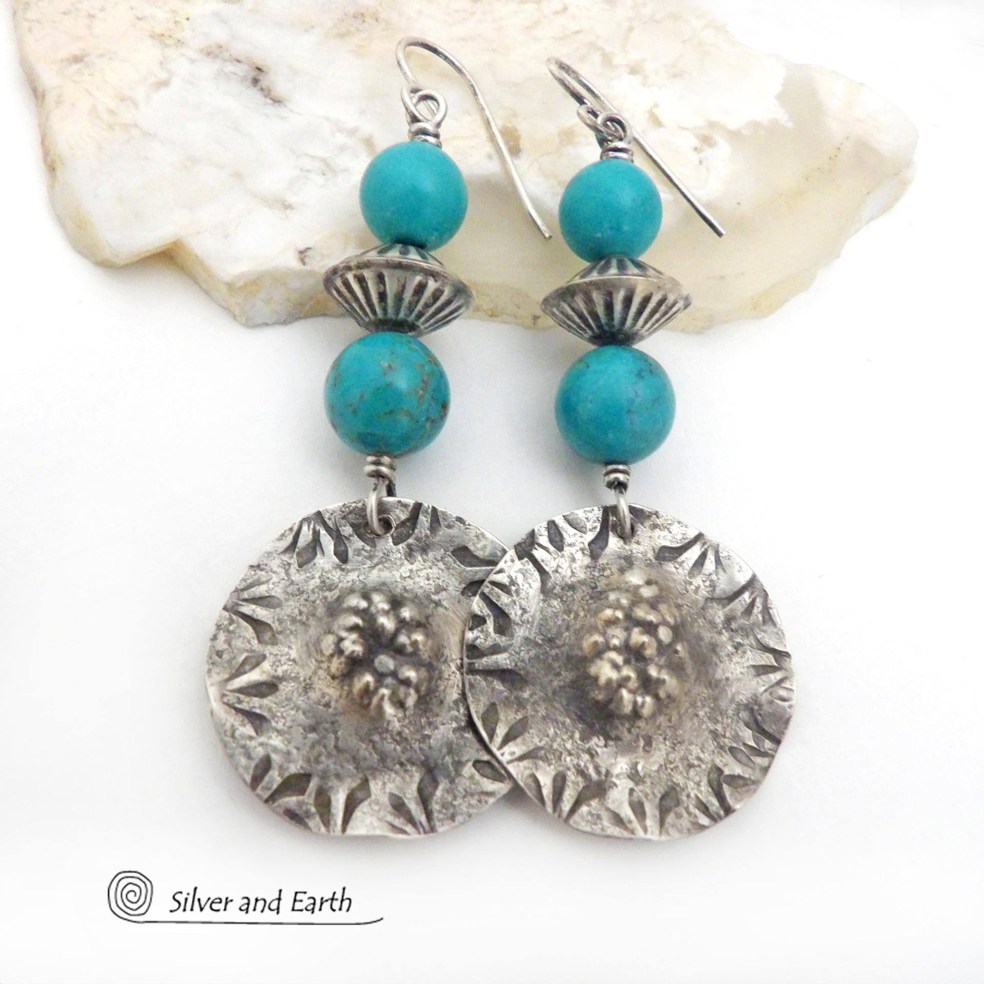 These handcrafted sterling silver earrings have a rustic hammered and hand stamped texture and are accented with a stack of turquoise and sterling silver beads. The silver beads have a fluted corrugated texture and an oxidized satin finish. Bold and striking, they have an earthy organic vibe with southwest style and flair that will look great with all types of outfits. Handmade by Silver and Earth, a New Mexico True Certified business. 
