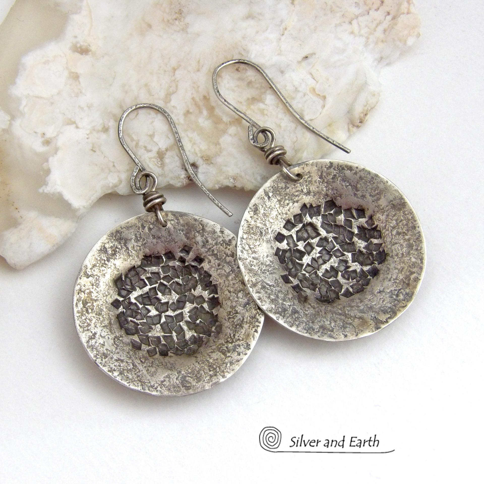 Bold, earthy and modern - these sterling silver dangle earrings are perfect for everyday wear. A classic staple for every jewelry lover's wardrobe - because they go with everything! Handcrafted entirely in solid sterling silver. I created the shapes out of sterling silver sheet; hammered and stamped the metal to create the rustic, organic texture; then oxidized them to enhance the detail. Handmade in the USA by Silver and Earth Jewelry.