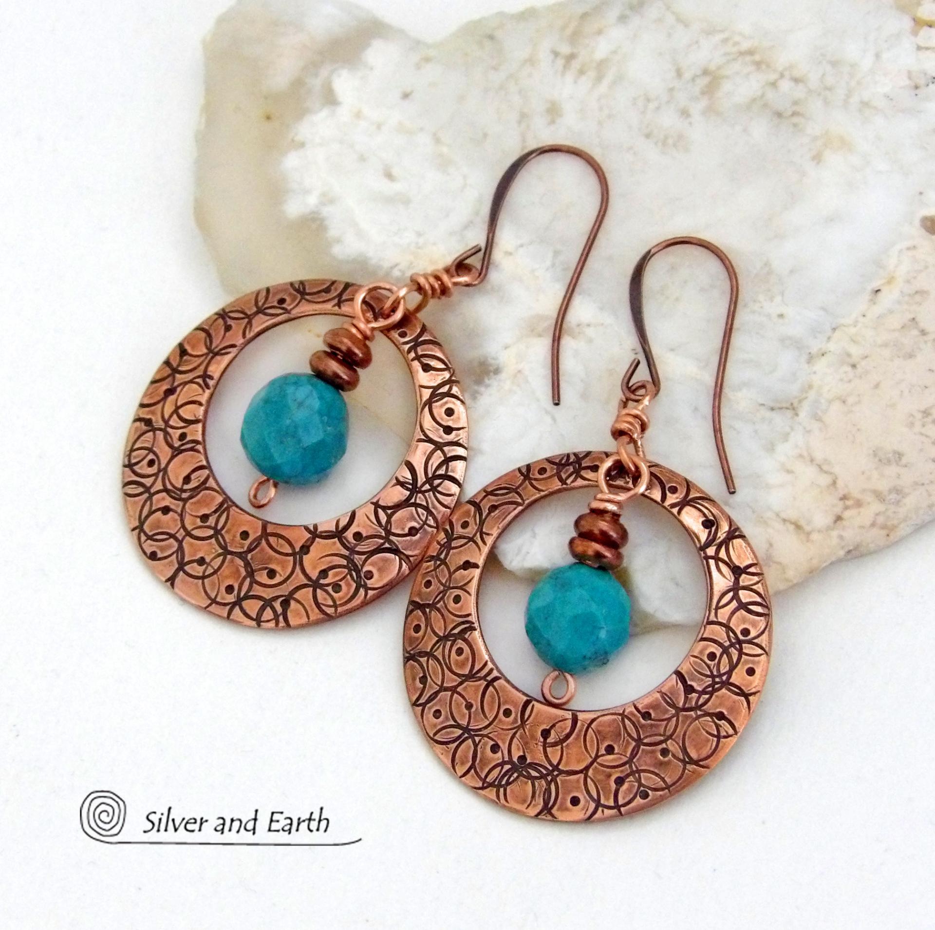 These handcrafted copper hoops have a hand stamped texture and are accented with faceted natural turquoise gemstones dangling in front. Perfect for all wardrobes types - they have a trendy modern style with a touch of southwestern flair. Perfect for women that love to make a bold statement and appreciate artisan handcrafted unique jewelry. Handmade in the USA by Silver and Earth Jewelry. Your choice of ear wires - copper or hypoallergenic niobium. 