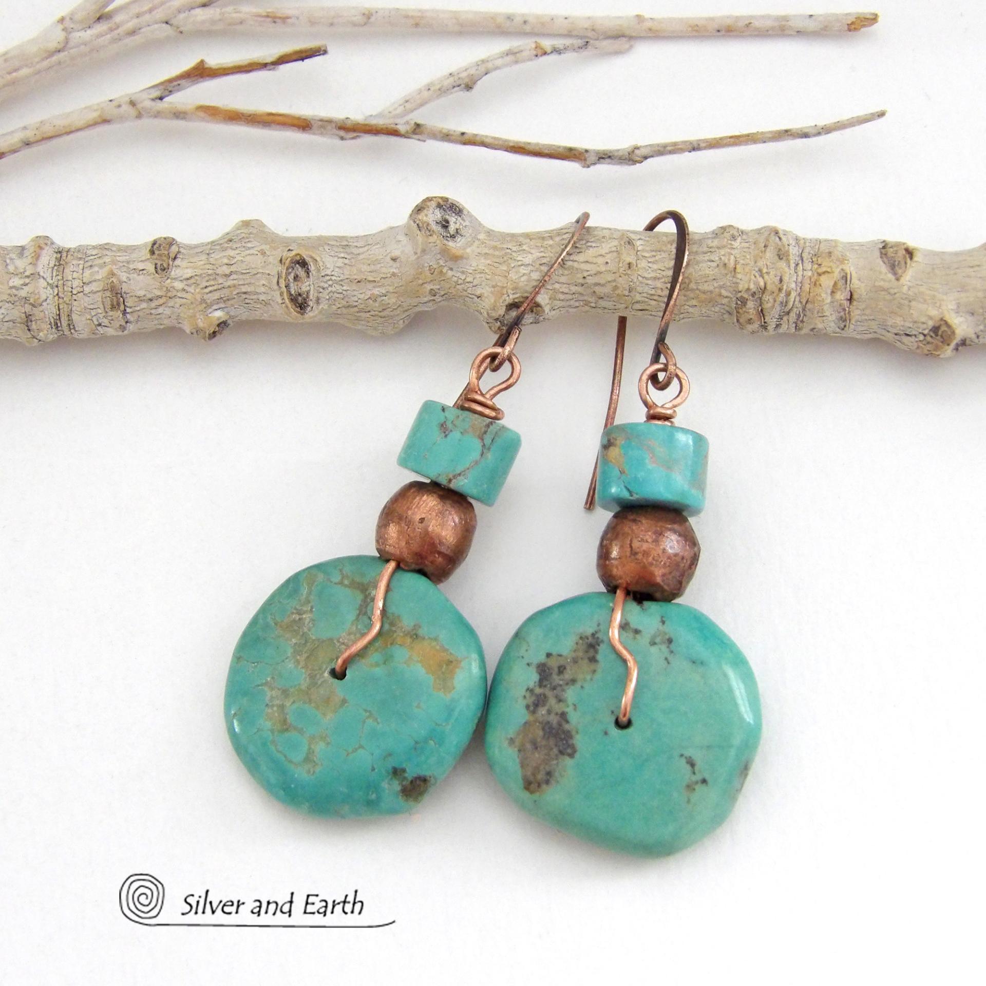 Chunky natural turquoise gemstones are wrapped in copper wire and are accented with copper and turquoise beads in these modern southwest style earrings. They have a casual, earthy style and will make a great gift for anyone that loves natural turquoise stone jewelry - or a nice addition to your own jewelry wardrobe. Handmade in the USA by Silver and Earth Jewelry. 