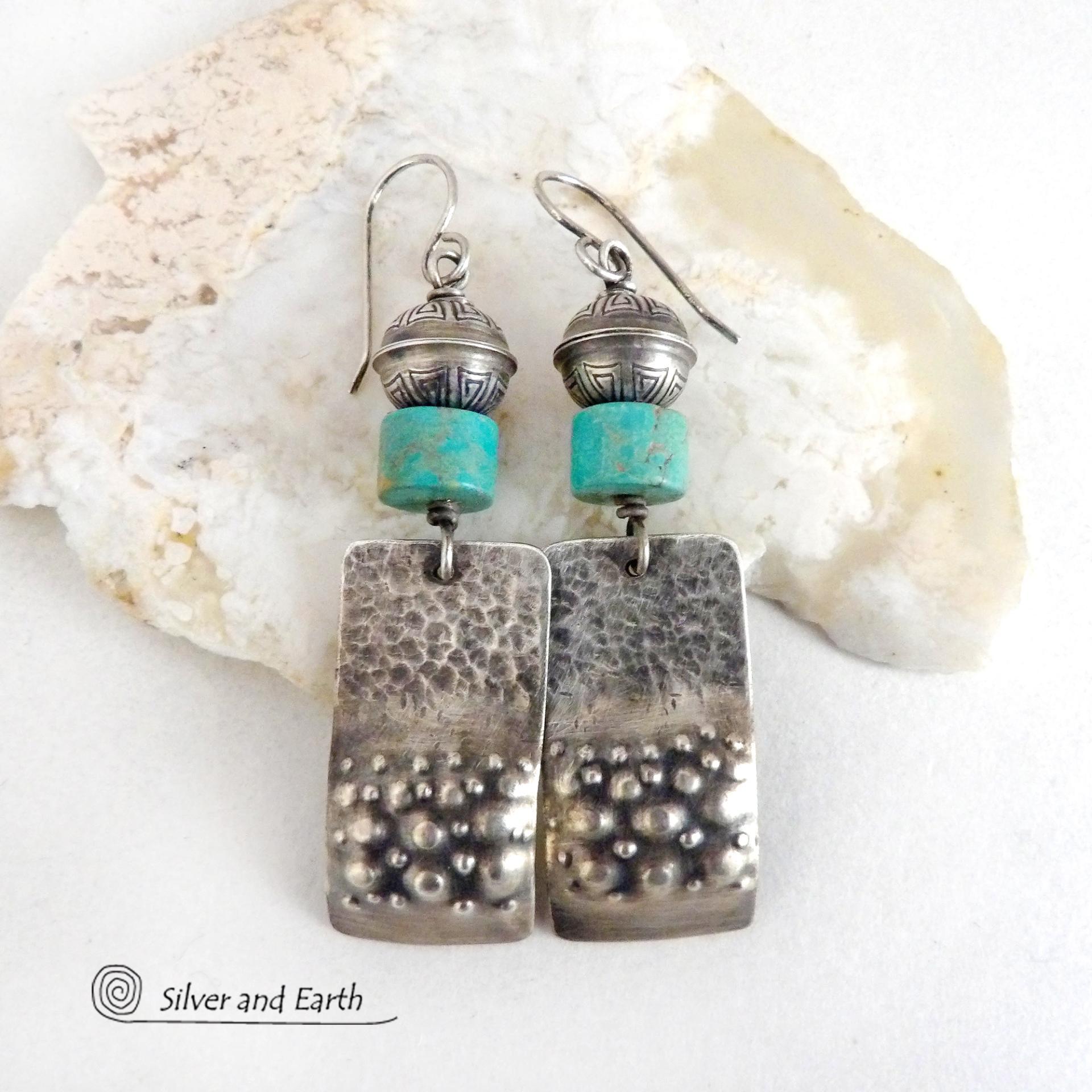 These handcrafted earrings feature sterling silver rectangles with a hammered and hand stamped texture accented with natural turquoise stones. They are topped off with oxidized and stamped Native American made sterling silver beads.They have a modern, southwest tribal style and will make a bold statement. Perfect for anyone that loves southwest style jewelry. The earrings are handmade and are a beautiful example of southwest style jewelry. Handmade by Silver and Earth, a New Mexico True Certified business.