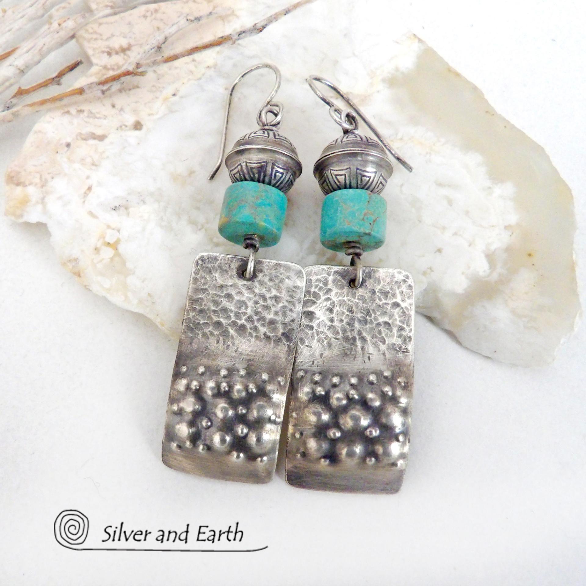 These handcrafted earrings feature sterling silver rectangles with a hammered and hand stamped texture accented with natural turquoise stones. They are topped off with oxidized and stamped Native American made sterling silver beads.They have a modern, southwest tribal style and will make a bold statement. Perfect for anyone that loves southwest style jewelry. The earrings are handmade and are a beautiful example of southwest style jewelry. Handmade by Silver and Earth, a New Mexico True Certified business.