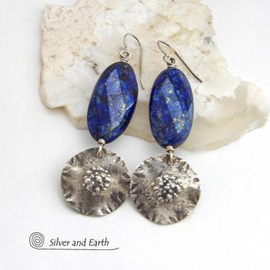 Handcrafted earrings with large blue lapis lazuli gemstones with a faceted finish accented with sterling silver dangles. Unique and one-of-a-kind, they'll make a bold statement.